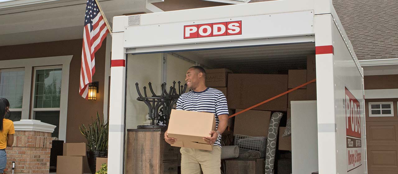 Man using a PODS container for his military move