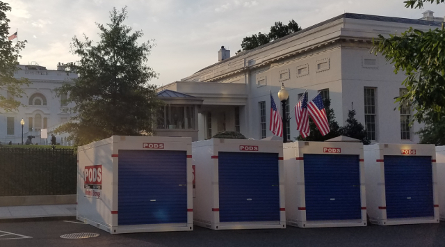 PODS containers at white house renovation at sunset