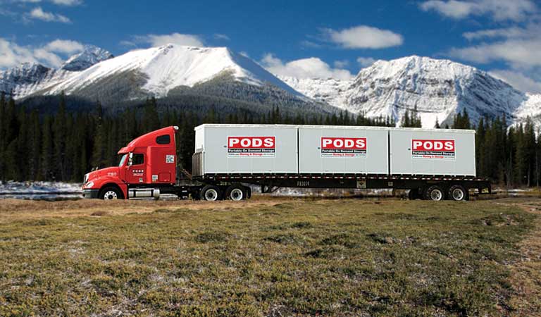 A truck taking pods containers to employee’s houses